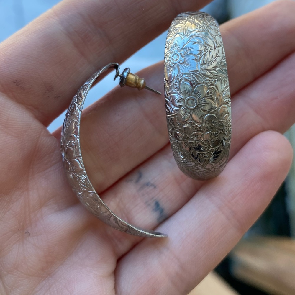 Silver colored floral earrings